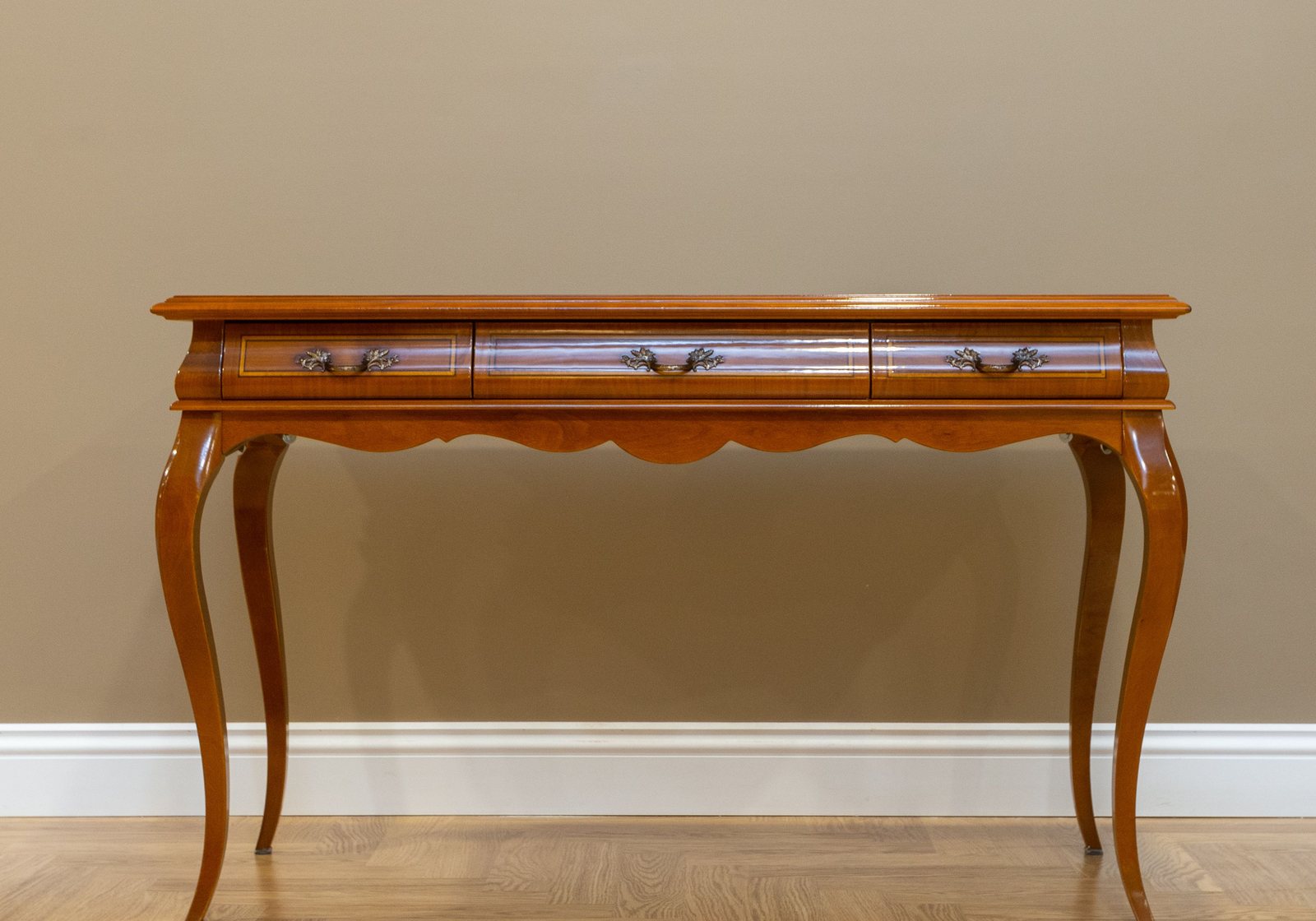 Warm wooden console table with quiet profile and polished room-ready detail