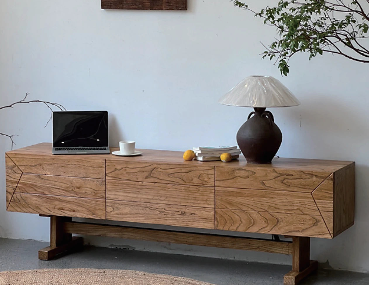 Low solid timber media console with continuous grain